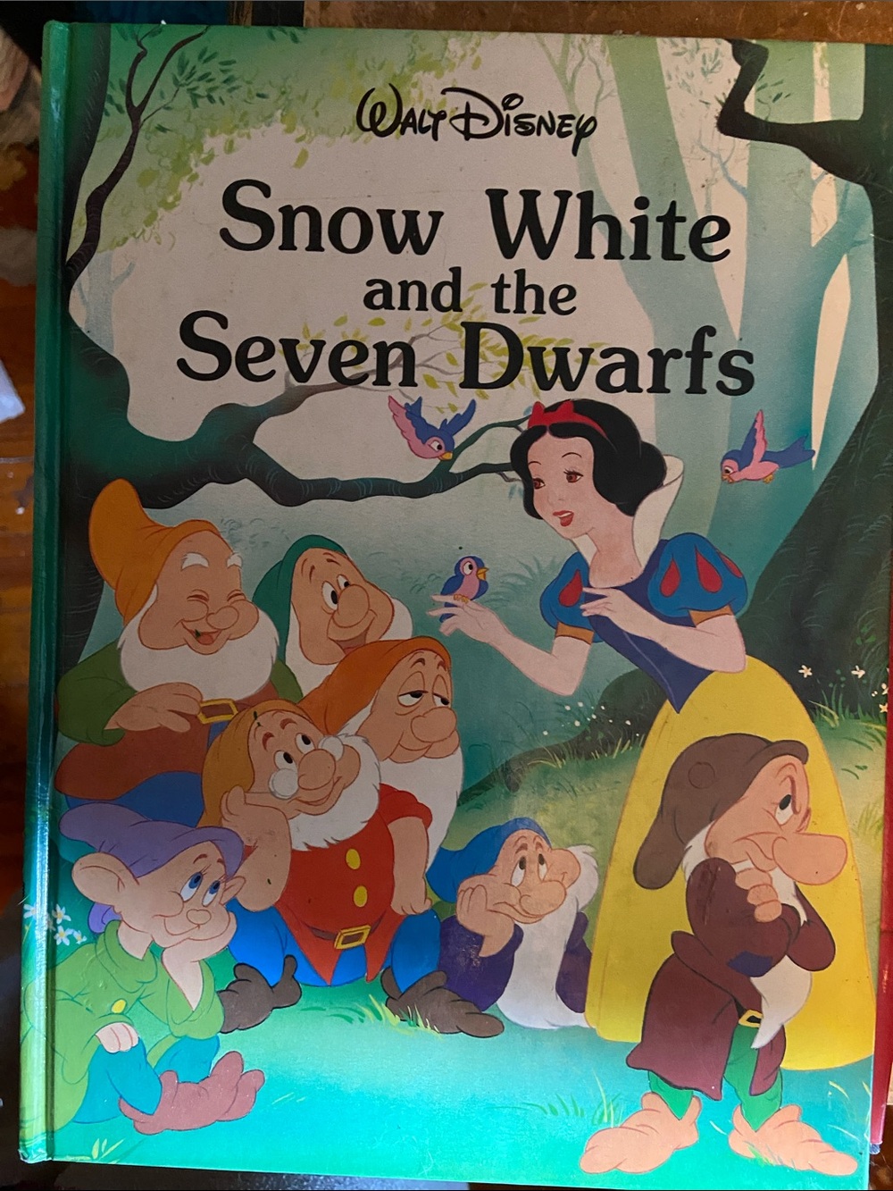 Walt Disney Snow White and the Seven Dwarfs Hardcover book tree birds blue green